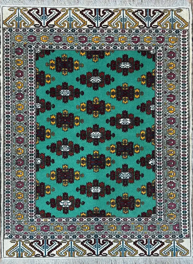 Green Turkmen rug handwoven in Golestan Iran with rare emerald color