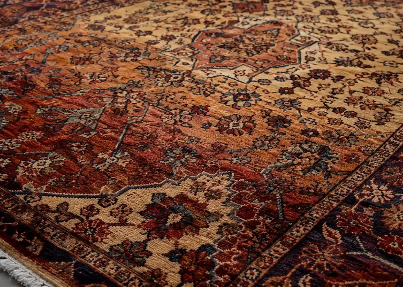 Abrash in handwoven rugs showing horizontal color variation in a Persian rug